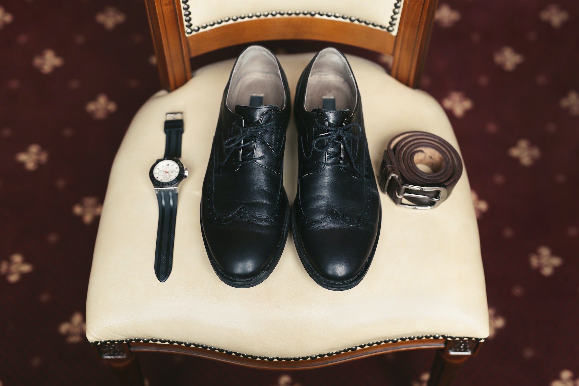 Groom is gathering in the morning.Men's classic shoes, belt,toilette, perfume, leather strap